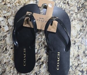 Coach Black Flipflop Sandals with Gold Accents